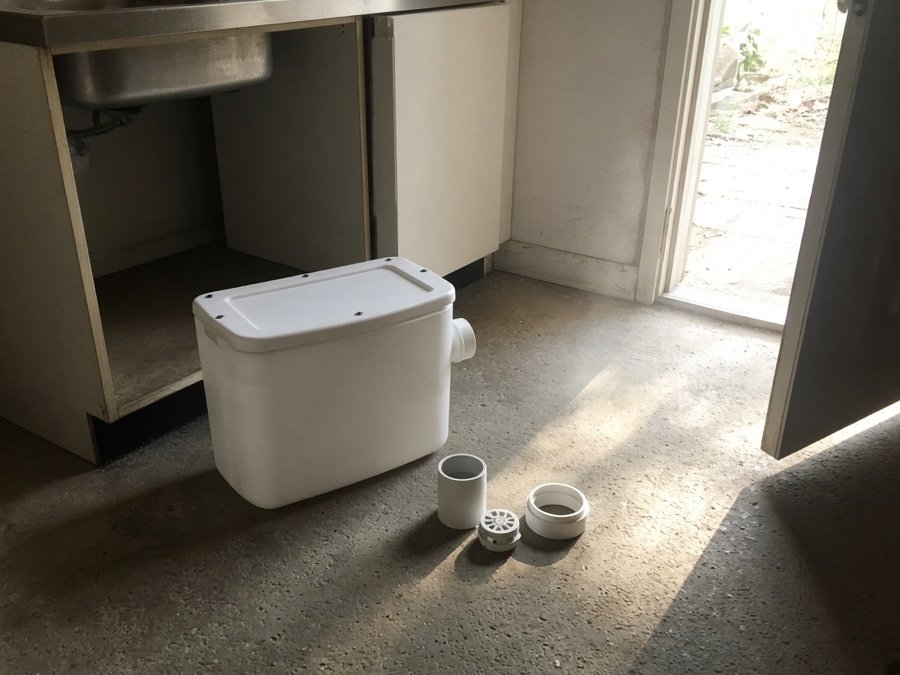New grease trap unit staged for installation — grease trap cleaning in Fullerton, CA